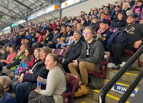 Garaga employees from Barrie facility in Ontario cheering for their favourite hockey team, the Colts , in a big tournament.